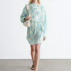 Vestido midi con cuello vuelto estampado