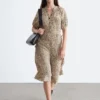 Vestido midi con lazo en la cintura