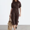Vestido midi con lazo en la cintura