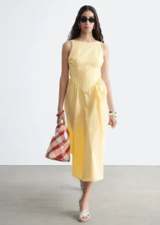 Vestido midi con lazo en la espalda