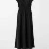 Vestido midi con mangas abullonadas