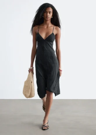 Vestido midi liso con lunares