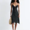 Vestido midi liso con lunares