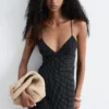 Vestido midi liso con lunares