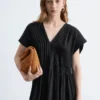 Vestido midi plisado con mangas dolman