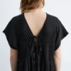 Vestido midi plisado con mangas dolman