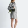 Vestido mini tipo camisa cruzada