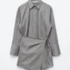 Vestido mini tipo camisa cruzada